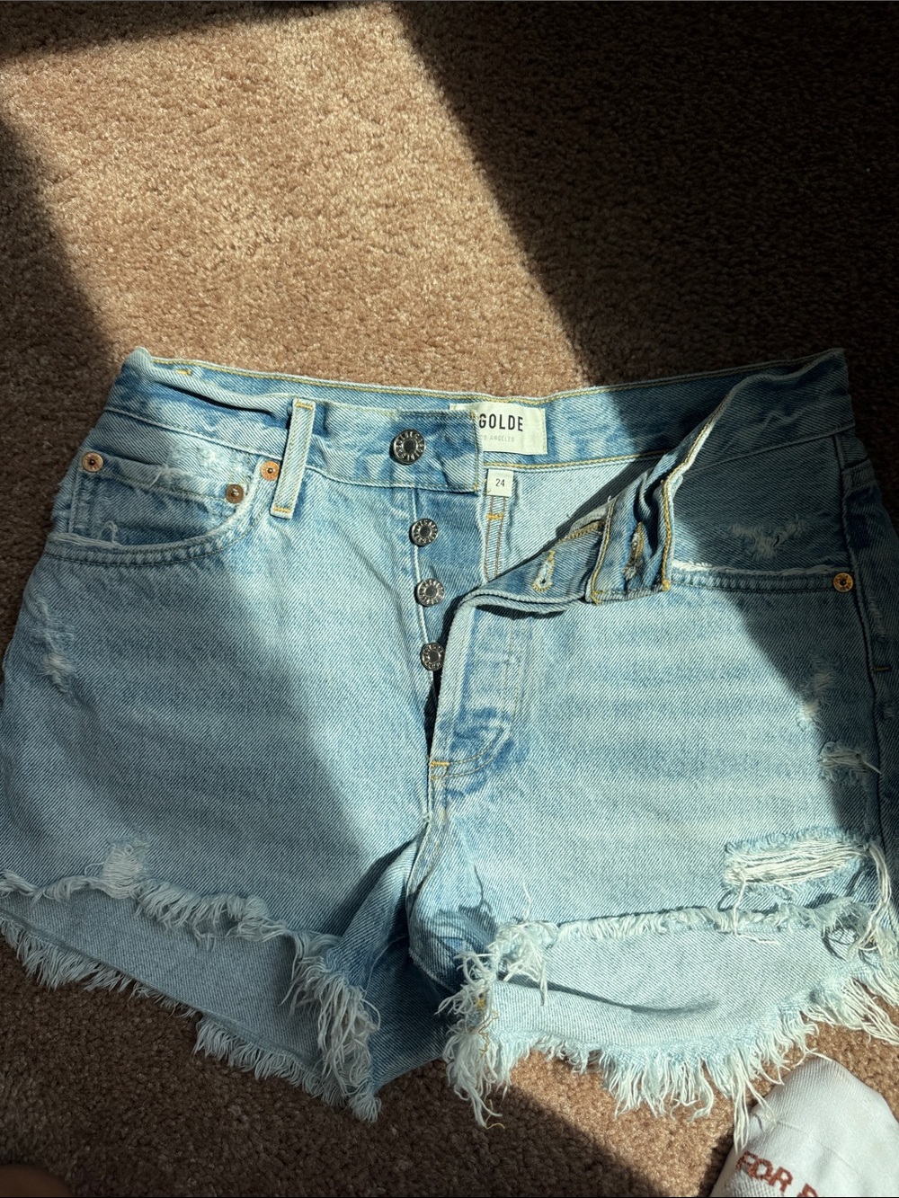 Agolde Light Blue Distressed Denim Cutoff Shorts